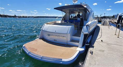 Seaduction boat hire  Seaduction is a 55ft Riviera sports yacht with a feature list comparable to yachts double its size